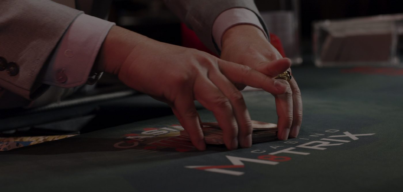 Dealer shuffling cards