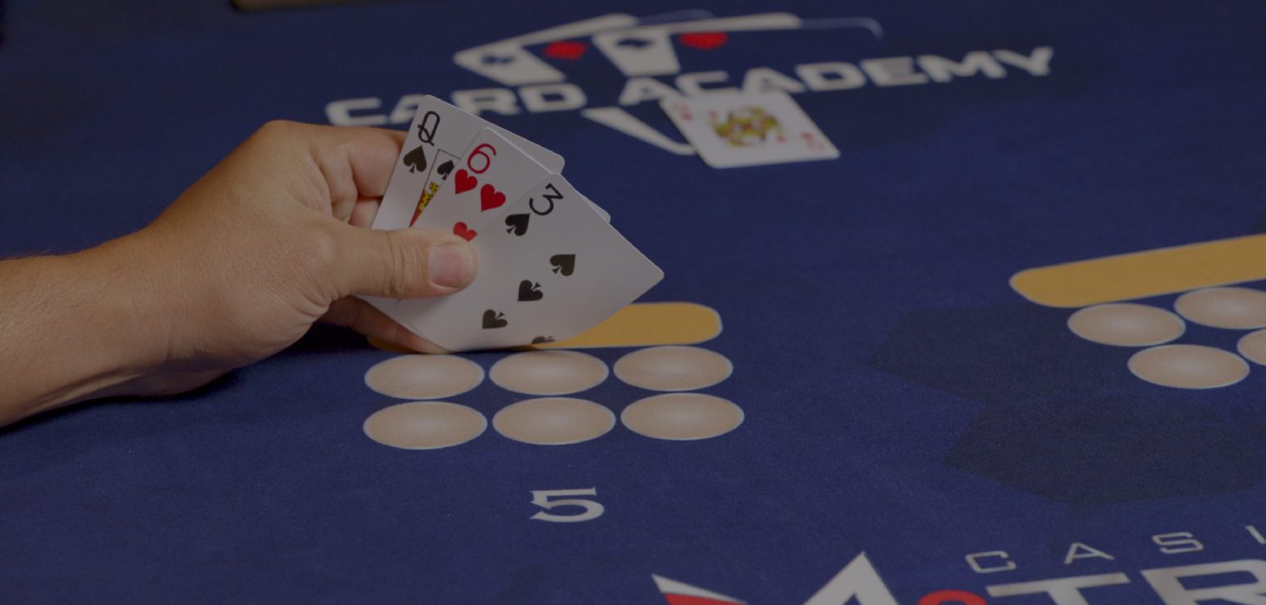 Hands holding cards